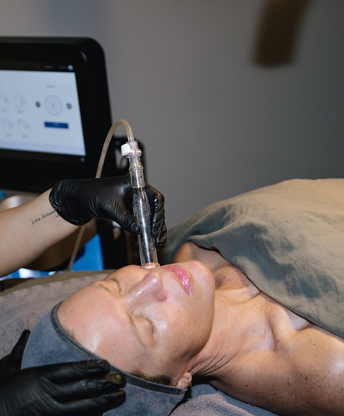 Facial treatment being performed on a client.