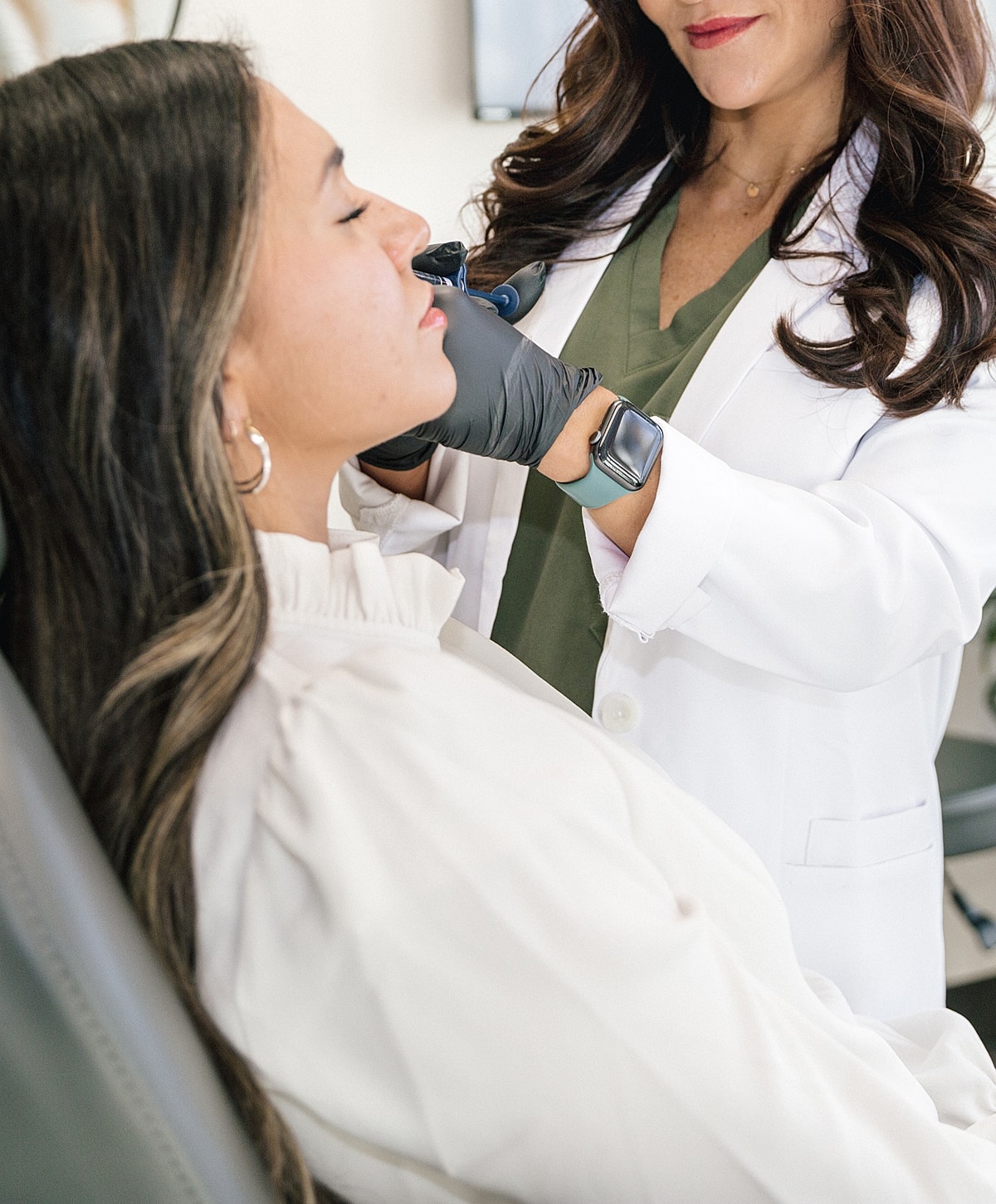 Salt Lake City botox model receiving cosmetic treatment from professional.