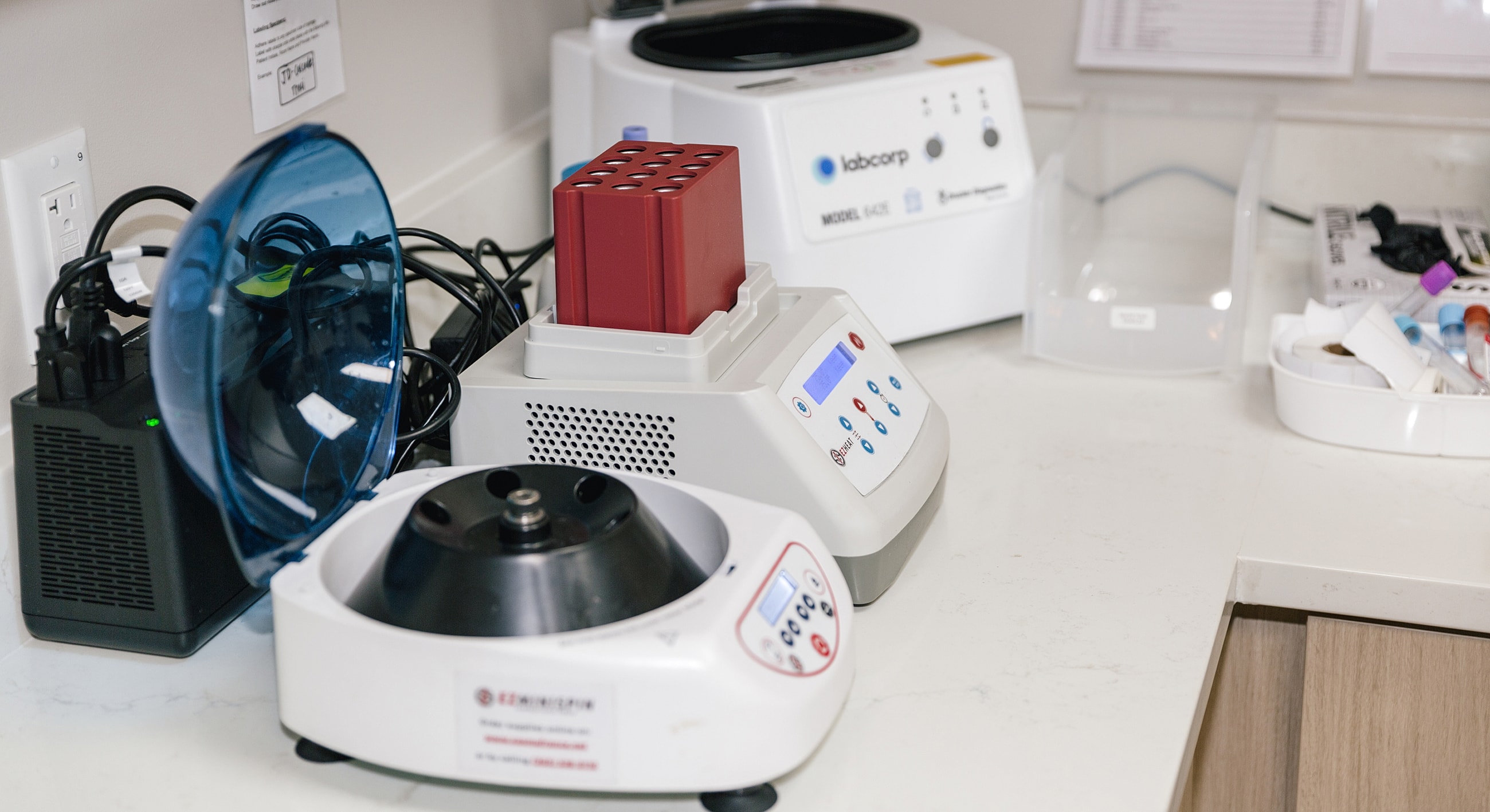 Laboratory equipment on a countertop setup.